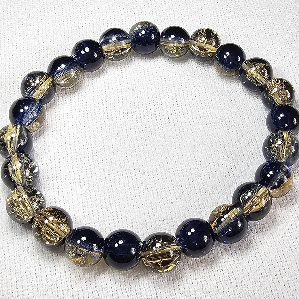 Elegant Gold and Black Bracelet Set with Ornate Beads